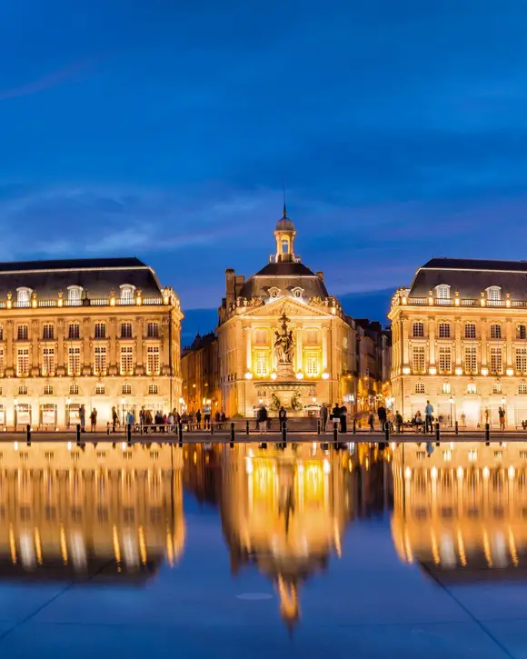 The Place de la Bourse and the water mirror at blue hour, in Bordeaux