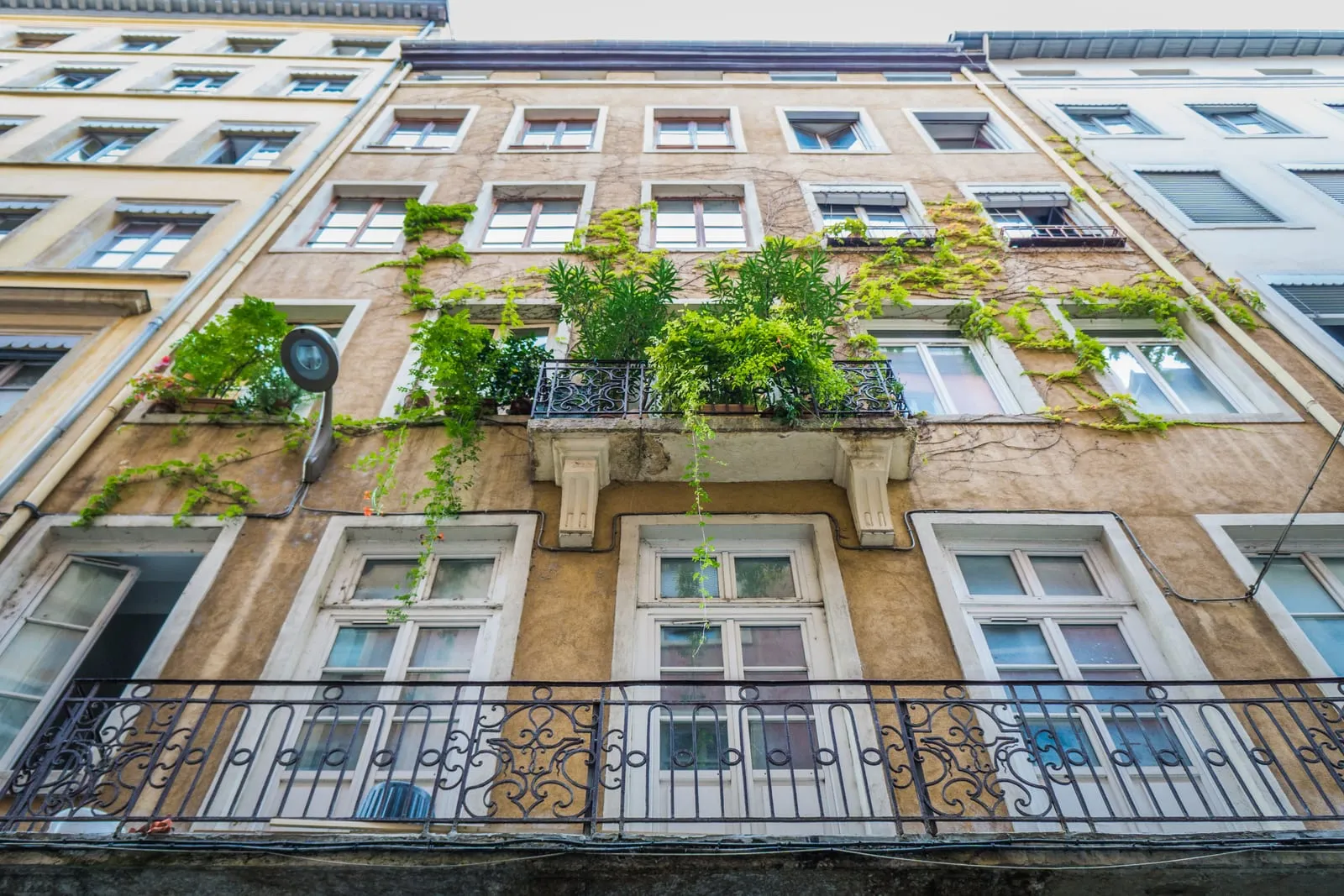 A façade with flower-filled balconies