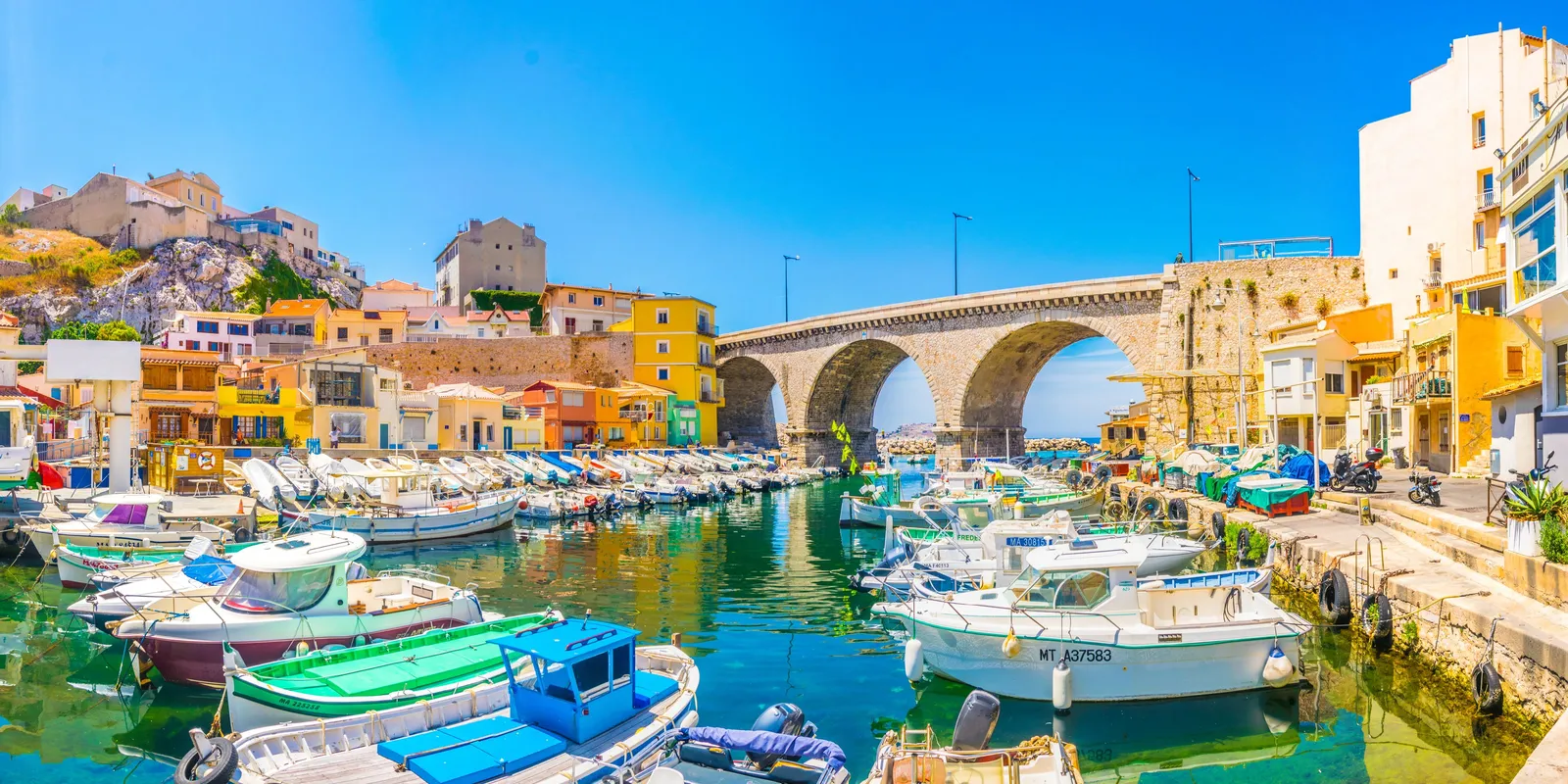 The Vallon des Auffes and its pointu boats beneath the corniche, in the Endoume district of Marseille