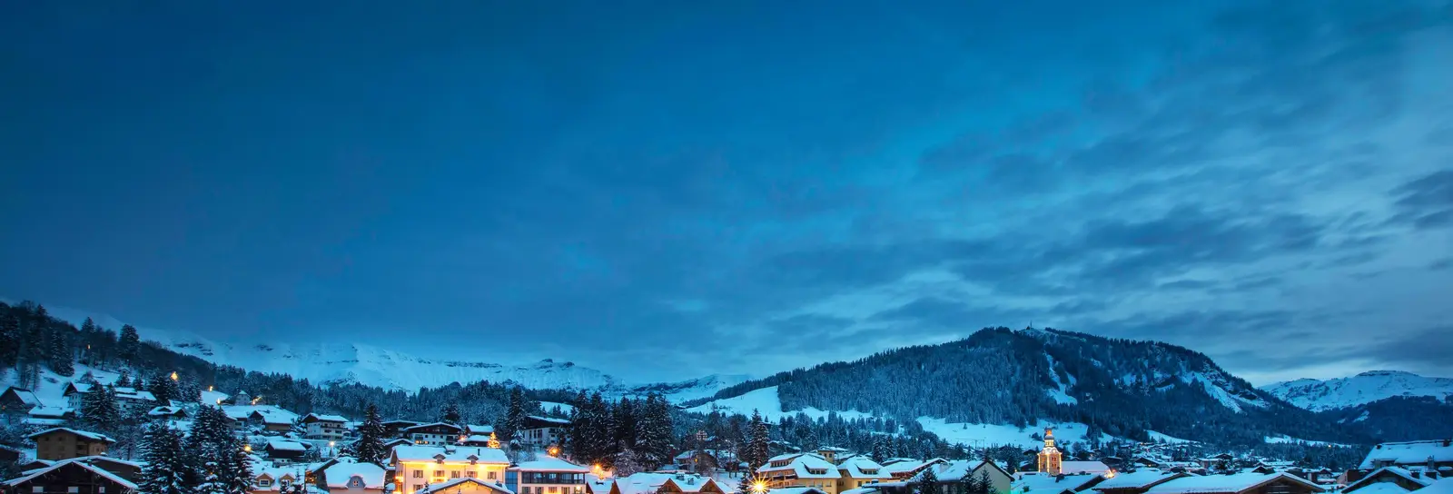 The village of Megève under snow, at blue hour