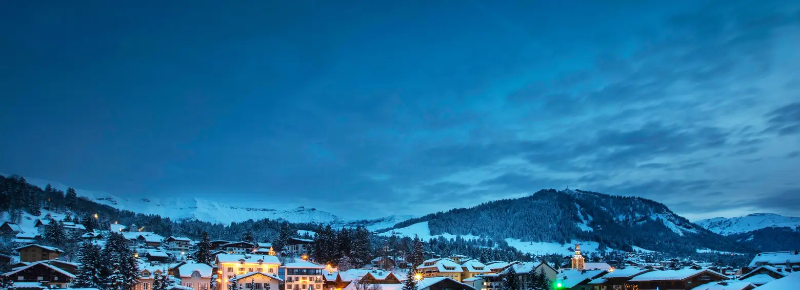 The village of Megève under snow, at blue hour