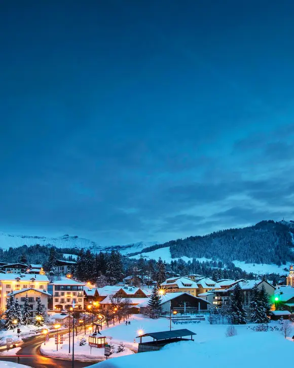 The village of Megève under snow, at blue hour