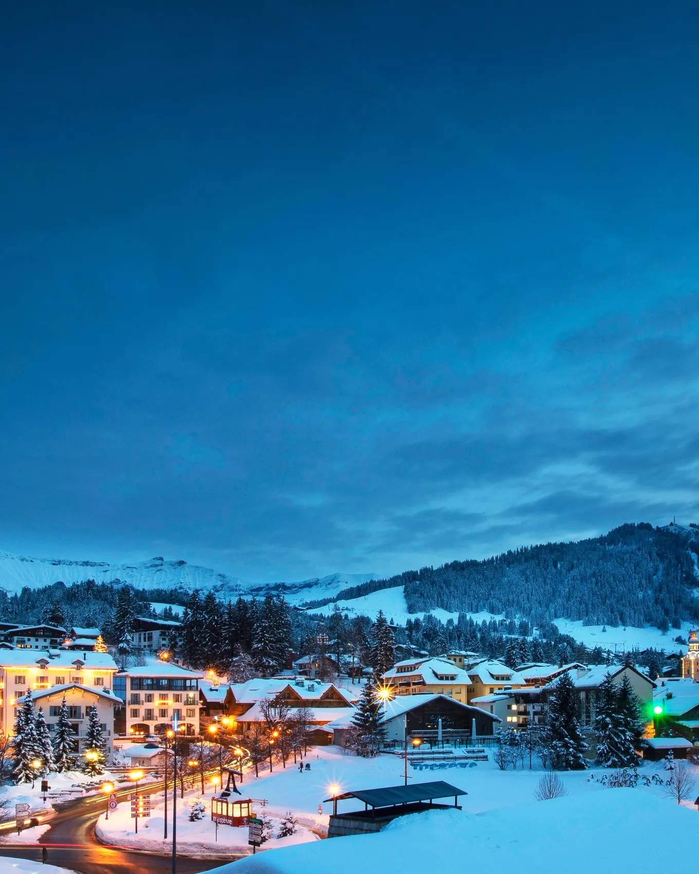 The village of Megève under snow, at blue hour