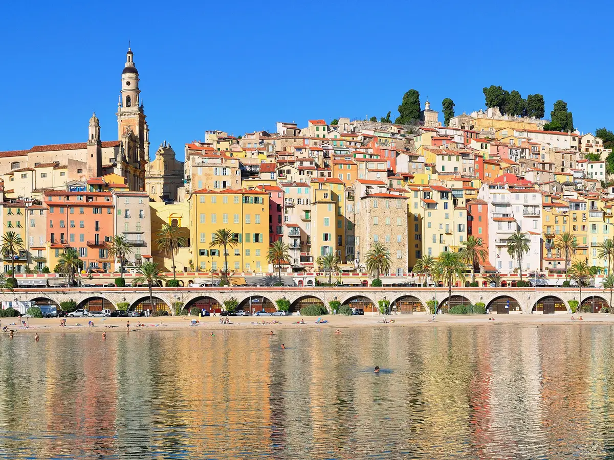 The old town of Menton and its pastel facades above the seafront promenade