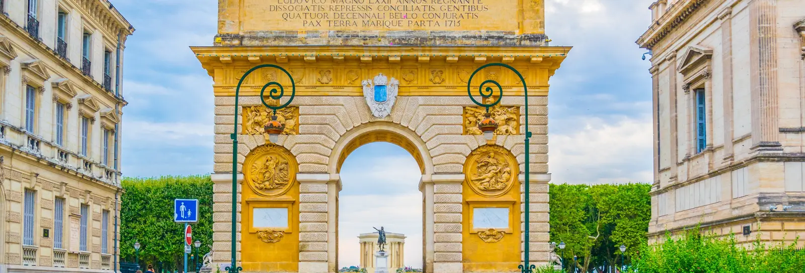The Porte du Peyrou triumphal arch at the end of rue Foch, in the Écusson, the historic heart of Montpellier