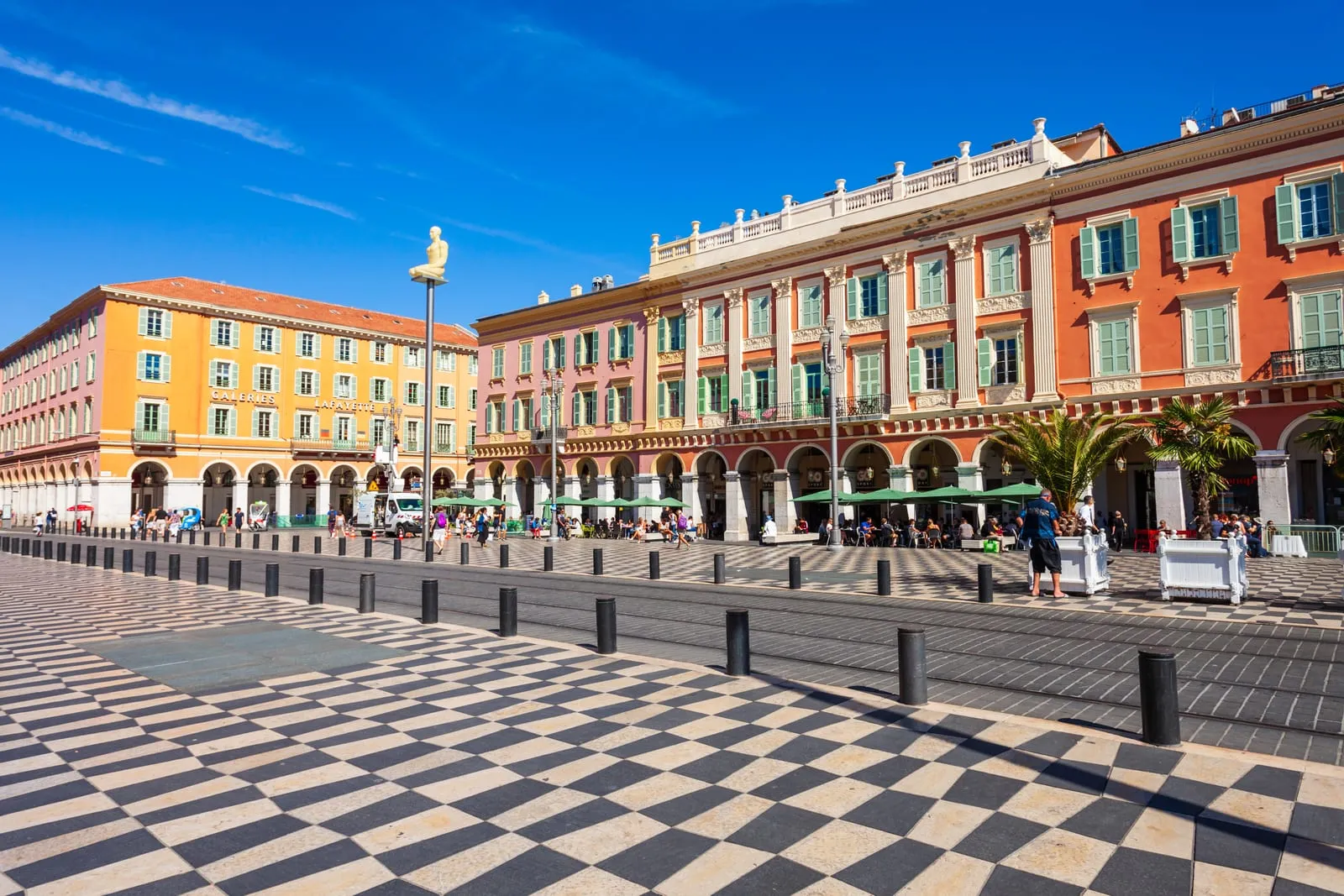 Place Masséna, its chequered paving and red façades
