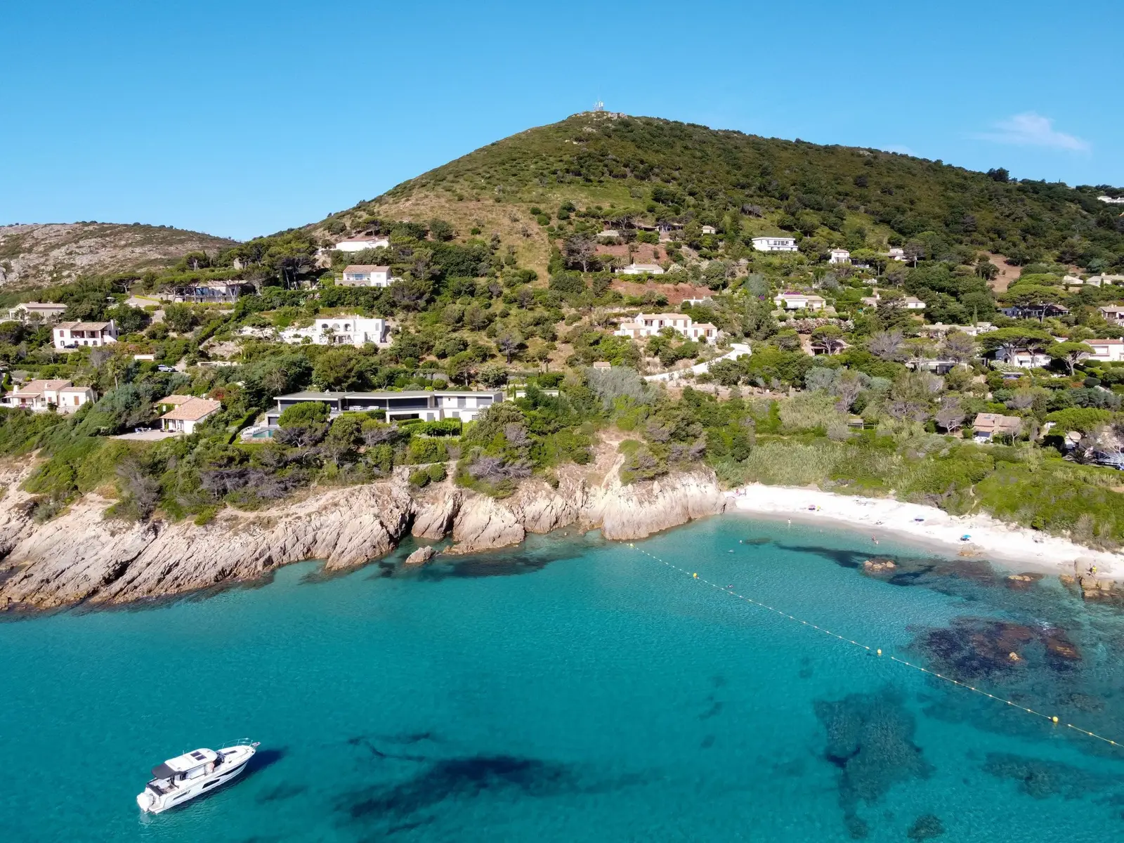 Hillside villas above a cove of pale sand, on the L’Escalet side of Ramatuelle