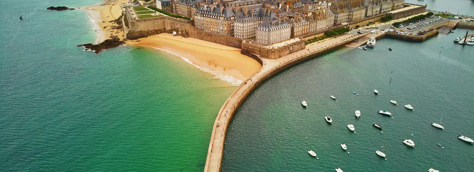 The walled city of Saint-Malo seen from the sky, the Môle des Noires jetty and the harbour