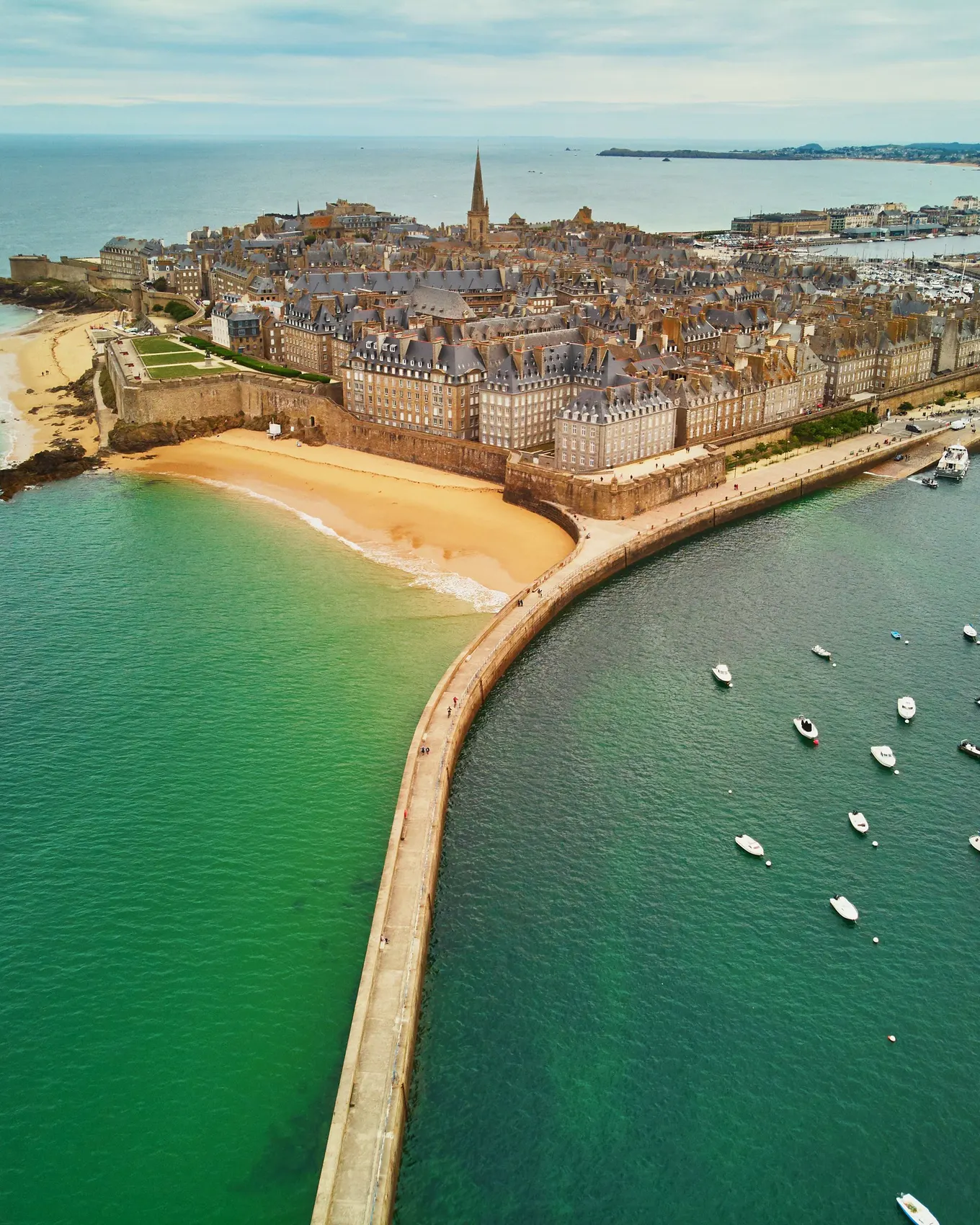 The walled city of Saint-Malo seen from the sky, the Môle des Noires jetty and the harbour