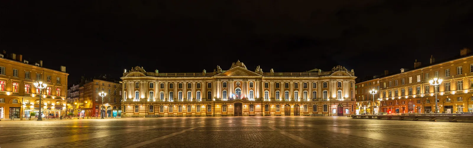 The Capitole of Toulouse, its façade lit up at night