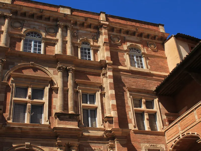 The Renaissance brick façade of a town mansion