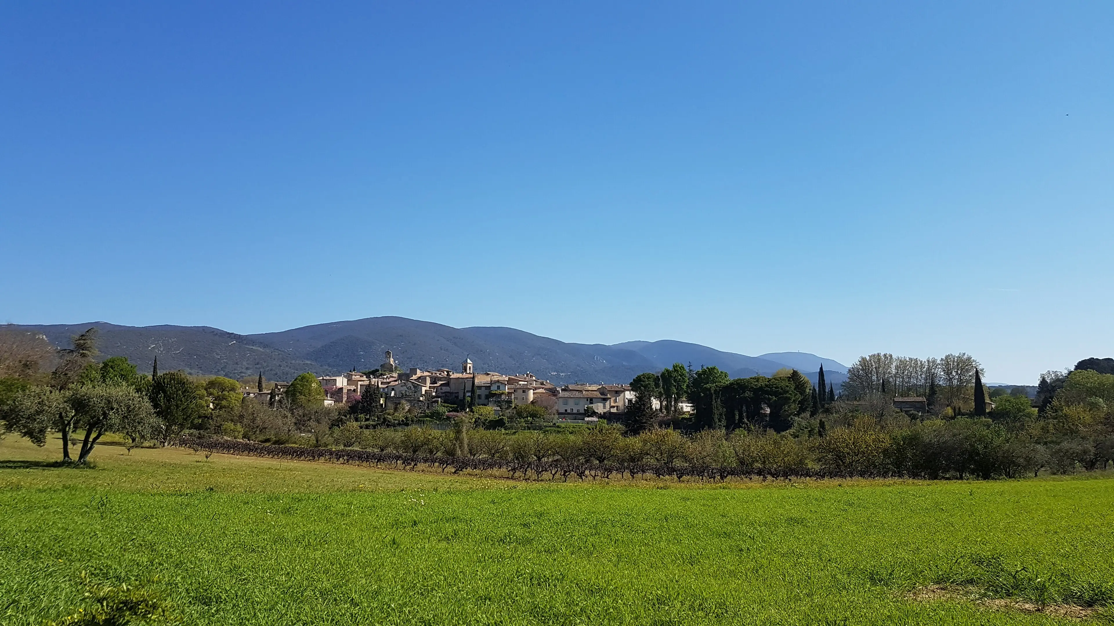 The village of Lourmarin at the foot of the south Luberon hills