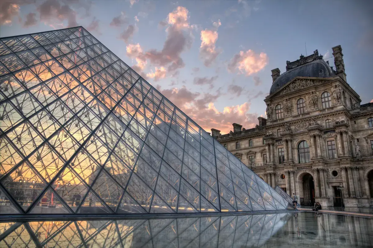 The Louvre pyramid at sunset in Paris 1st arrondissement