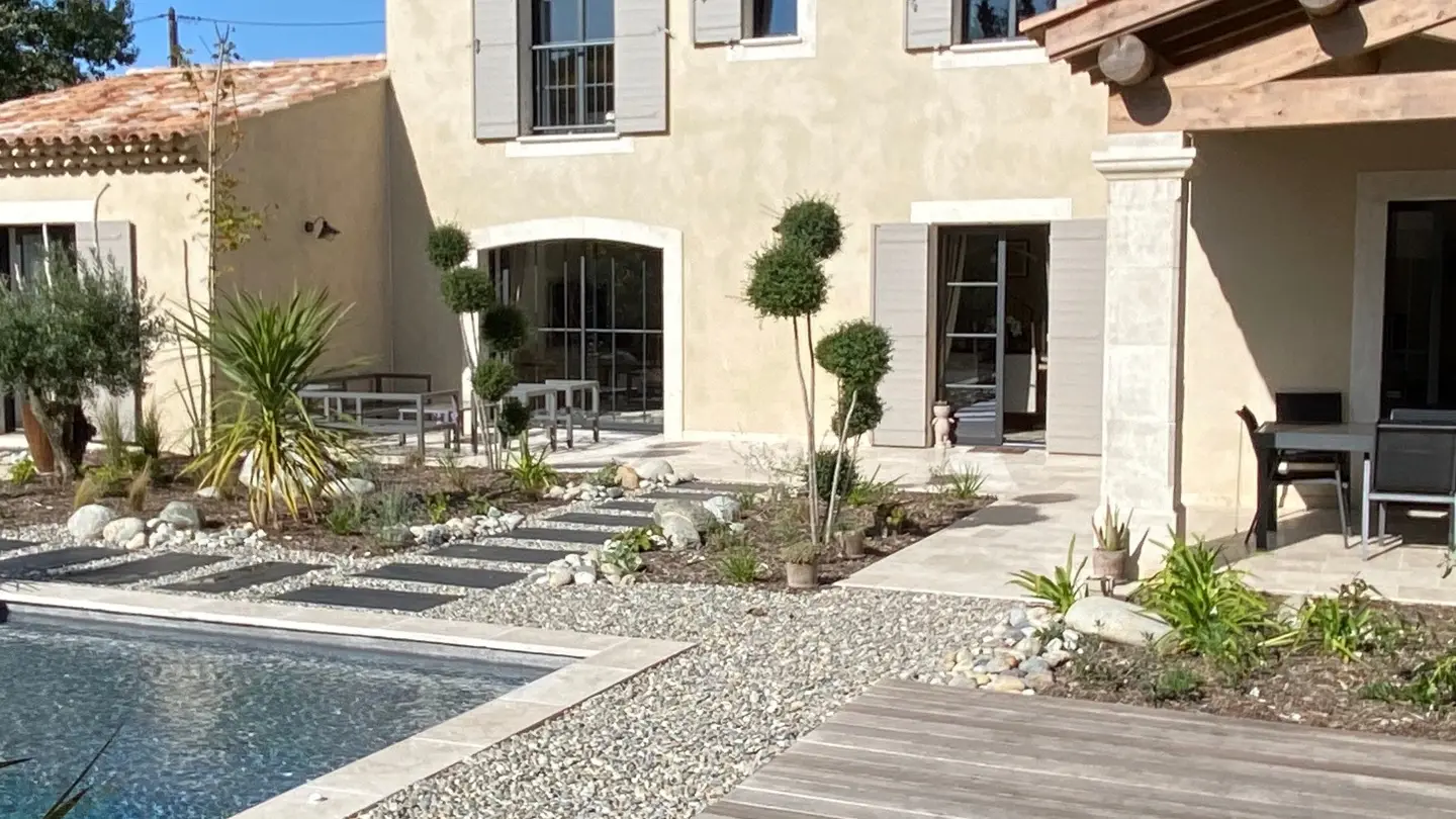 Provençal villa and its pool, wooden terrace in the southern sun