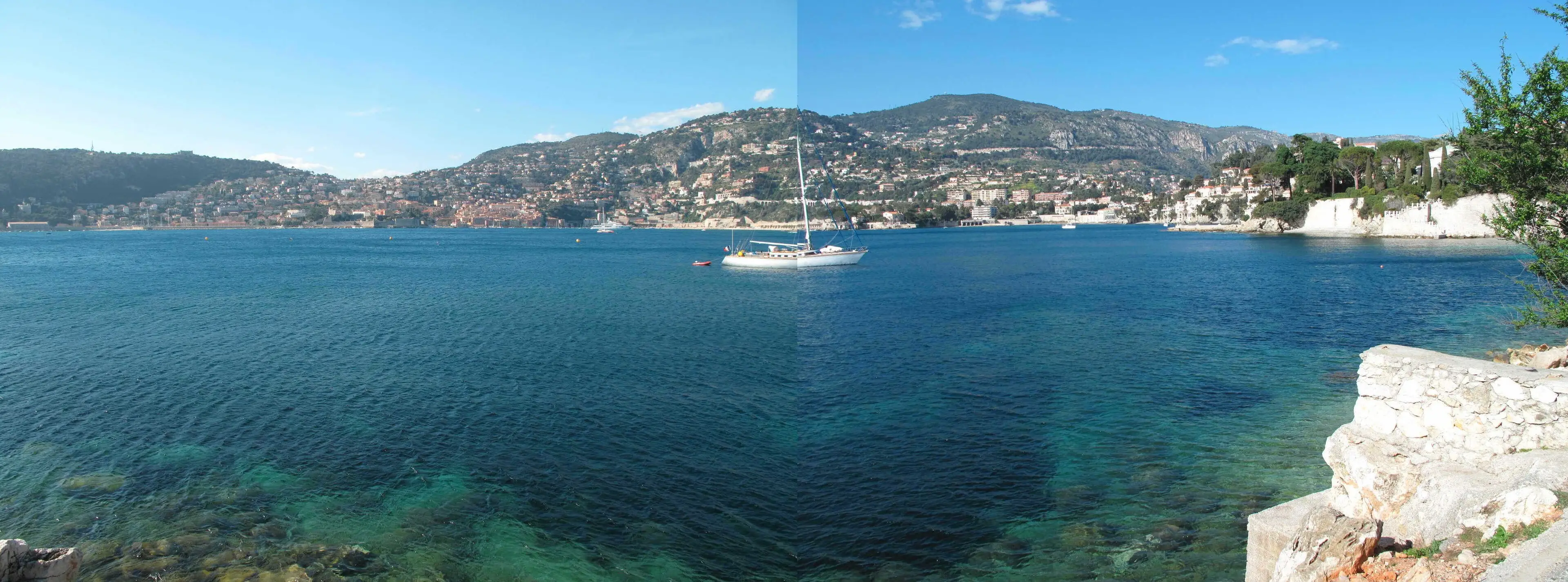 The roadstead of Villefranche-sur-Mer and the old town at the water’s edge, seen from the heights
